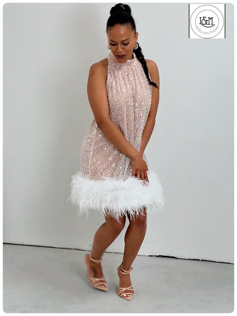 Amanda white beaded dress with white feathers around the hem